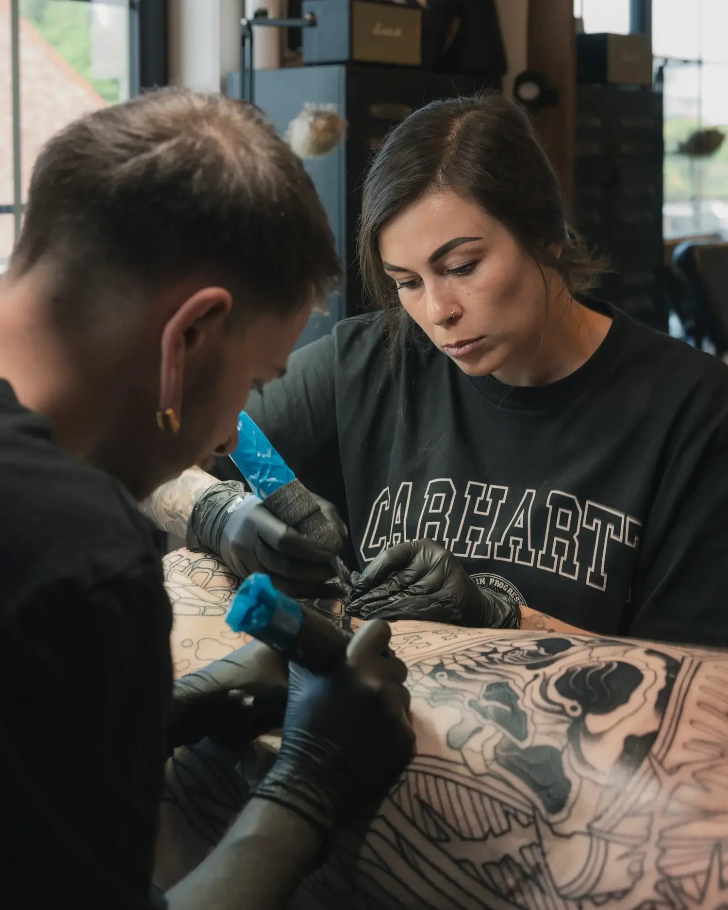 Naomy K., tattoo artist at Cobra Gold